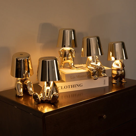 Small golden men table lamp